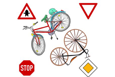 Zwei Fahrräder mit Verkehrsschildern