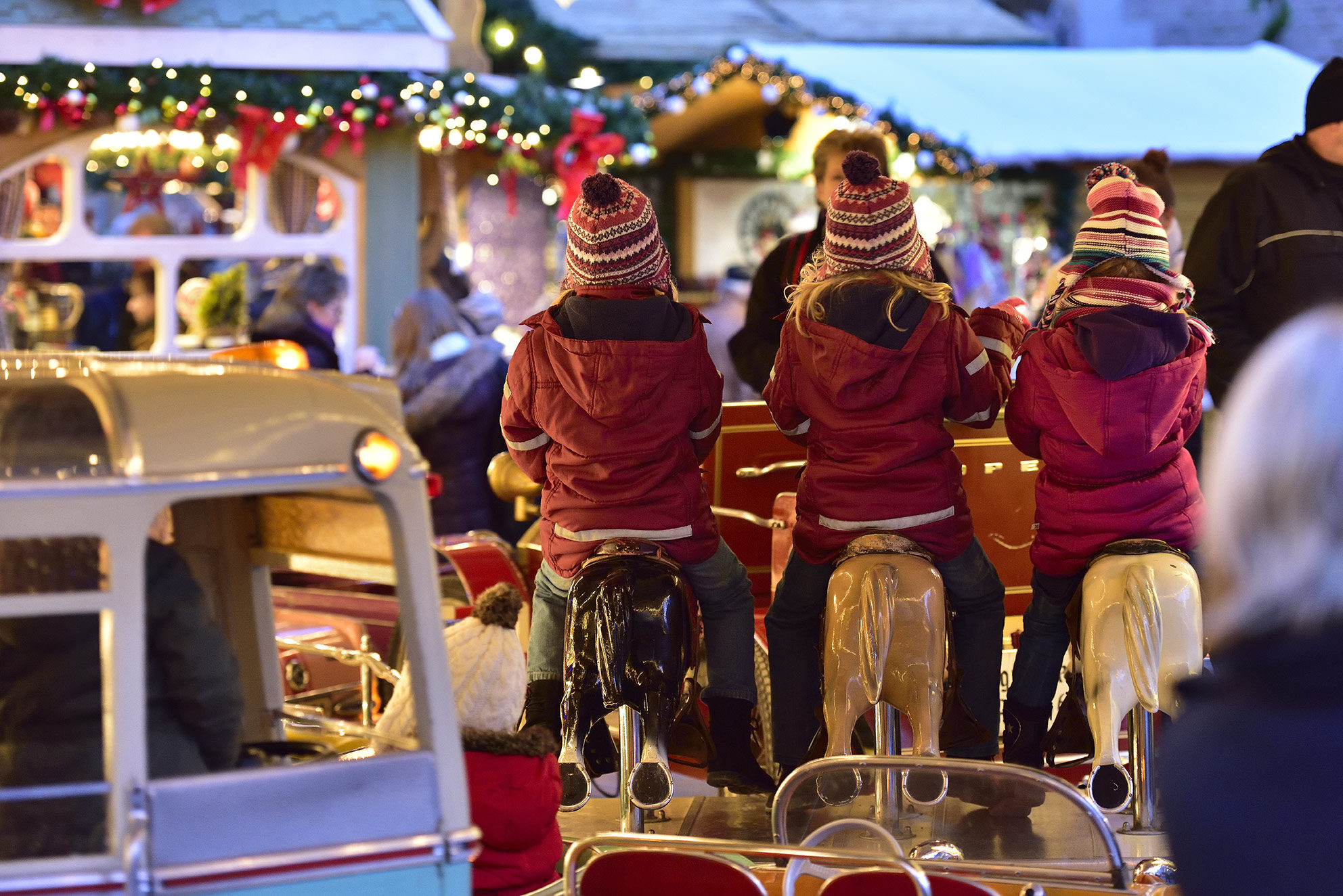 A carousel ride provides a lot of fun at the Christmas market. (Zoom on click)