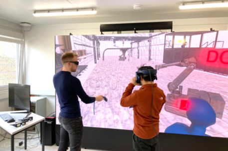 Forschende mit Virtual Reality an der digitalen Baustelle
