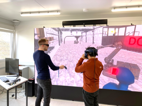 Forschende mit Virtual Reality an der digitalen Baustelle (Wird bei Klick vergrößert)